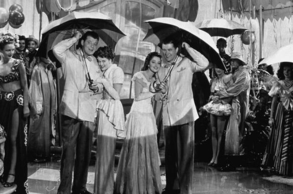 Jack Carson, Janis Paige, Martha Vickers and Dennis Morgan during the "Rainy Night in Rio" number.